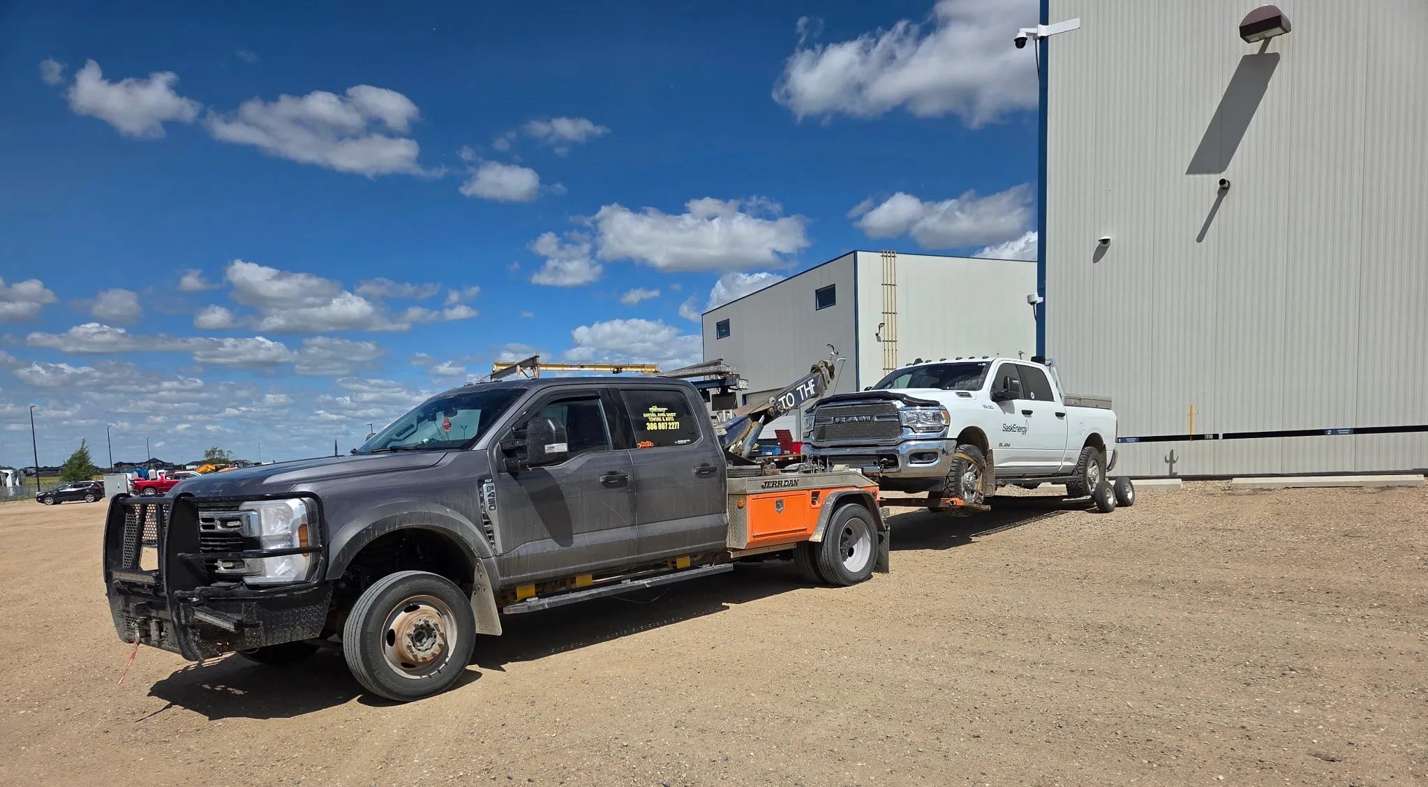All-Wheel Drive Flatbed Carrier Transport - Towing Gallery Regina